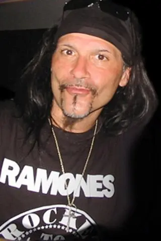 Al Jourgensen - Altura • Físico
